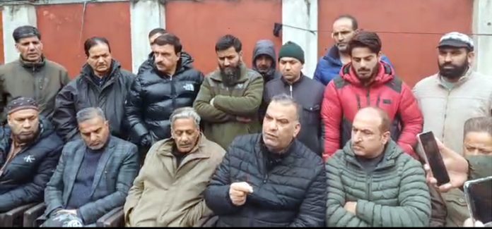 JKCCCC general secretary along with other office bearers addressing a press conference at Srinagar. JKCCCC general secretary along with other office bearers addressing a press conference at Srinagar.