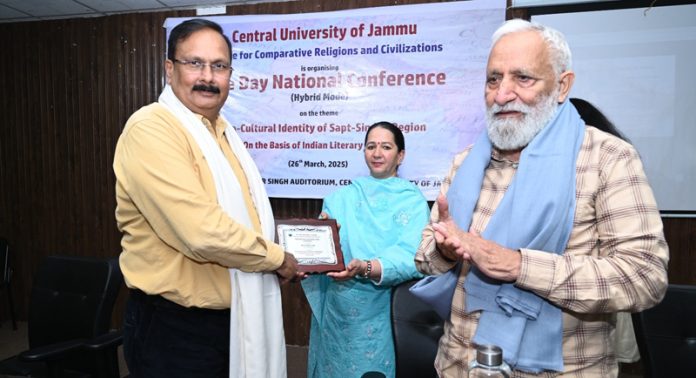 CUJ VC receiving memento during a conference at the university on Thursday.