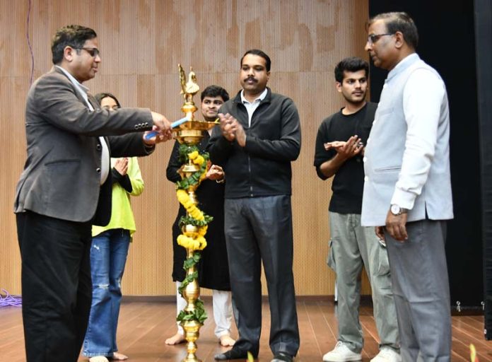 Prof B S Sahay, Director, IIM lighting the traditional lamp during a function held in Jammu on Friday.