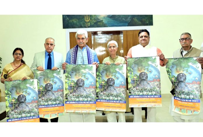 LG Manoj Sinha along with VKS members releasing Saptrishi Calendar at Raj Bhawan in Jammu.