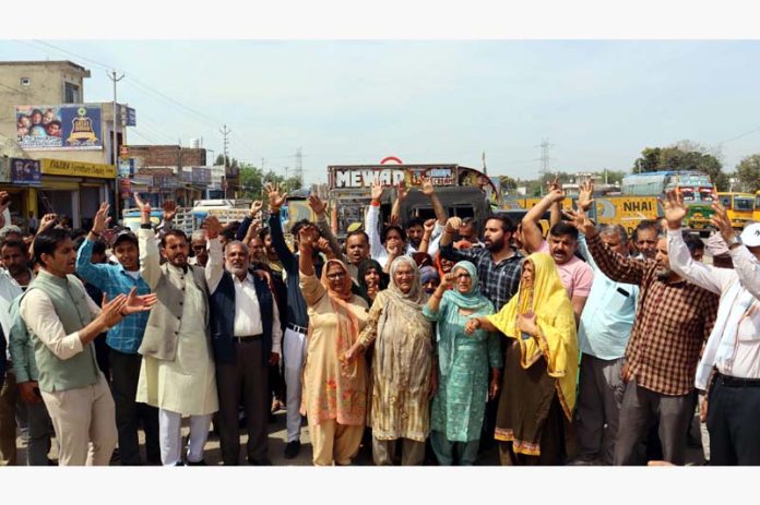 People staging protest at Jatwal main chowk in Samba district. People staging protest at Jatwal main chowk in Samba district.