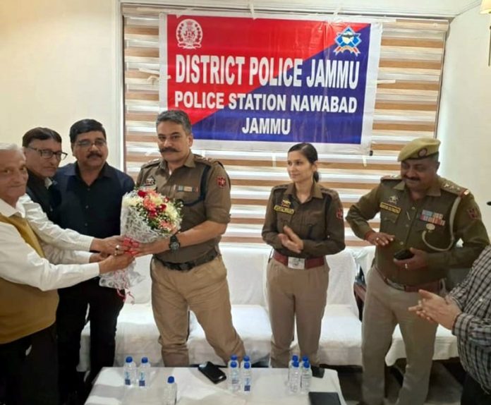 Police officers during a meeting with hoteliers in Jammu on Tuesday. Police officers during a meeting with hoteliers in Jammu on Tuesday.