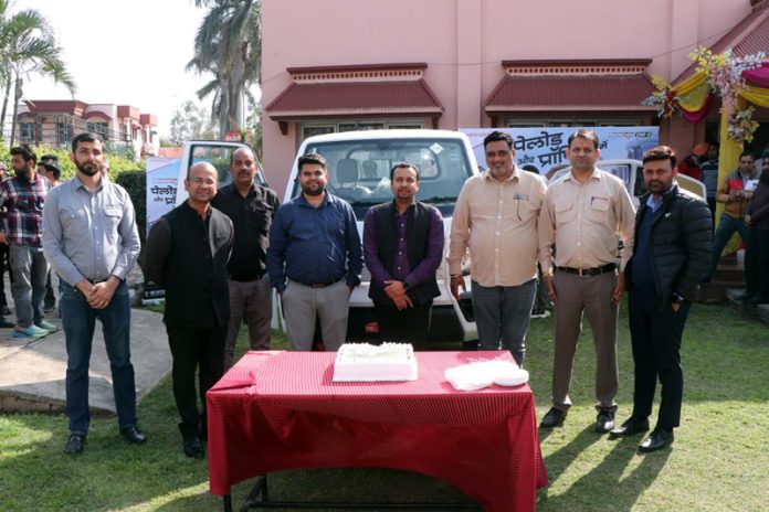 Officials of Mahindra launching CNG version of Veero in Jammu on Tuesday.