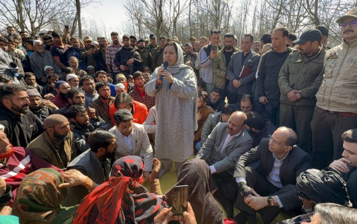DyCM, Minister Sakeena Itoo and Advisor to CM meeting family of youth who died mysteriously on Tuesday. -Excelsior/Sajad Dar