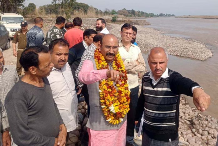 MLA Mohan Lal Bhagat inspecting works in Akhnoor on Sunday. MLA Mohan Lal Bhagat inspecting works in Akhnoor on Sunday.