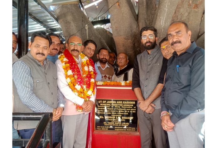 MLA Mohan Lal Bhagat inaugurating the renovated passenger shed at Akhnoor Bus Stand on Sunday.