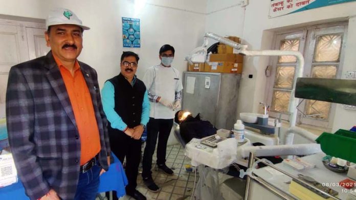 Doctors examining patients at a free camp in Bani on Sunday.