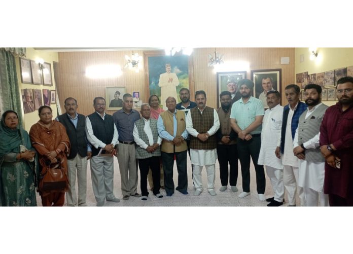 NC provincial president, Rattan Lal Gupta posing with a delegation at Sher-e-Kashmir Bhawan, Jammu. NC provincial president, Rattan Lal Gupta posing with a delegation at Sher-e-Kashmir Bhawan, Jammu.