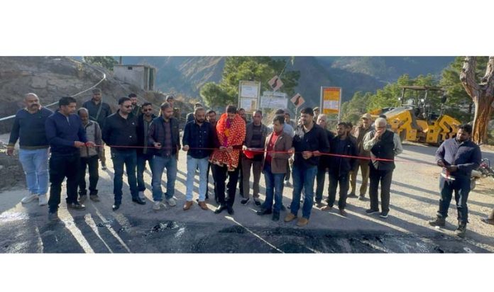 MLA, Pawan Kumar Gupta inaugurating road blacktopping work in Udhampur.