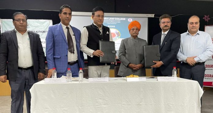 Gulchain Singh Charak, Chairman of the Dogra Educational Trust posing along with others during a function held on Saturday.