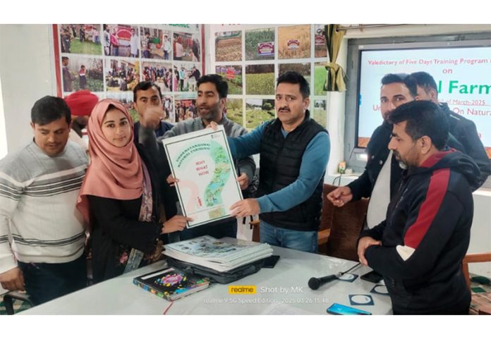 A participant receiving certificate after conclusion of training at KVK Pulwama.