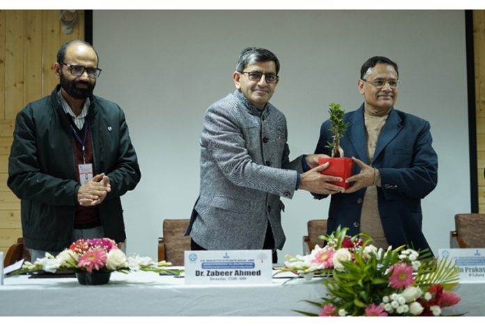 Director IIIM, Dr. Zabeer Ahmed felicitating Dr. O.P Sharma, (Retd PCCF) during a function in Srinagar. Director IIIM, Dr. Zabeer Ahmed felicitating Dr. O.P Sharma, (Retd PCCF) during a function in Srinagar.