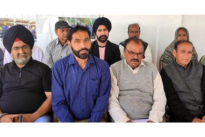 Members of Ex Central Paramilitary Forces Welfare Association, J&K addressing a press conference in Jammu on Monday.