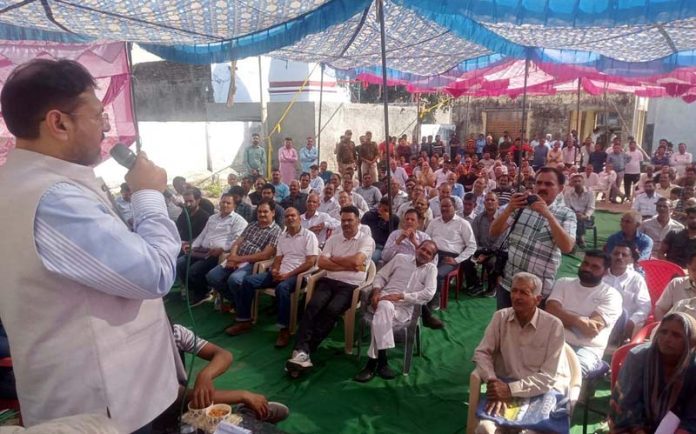 Minister Satish Sharma addressing during Public Darbar on Sunday.