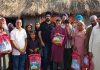 BJP Minority Morcha president Ranjodh Singh Nalwa posing with needy Muslims after distributing ‘Saugaat-e-Modi’ kits.