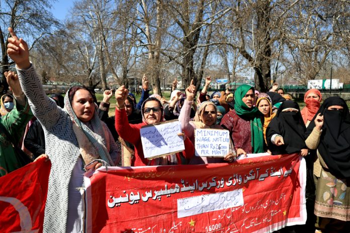 Anganwadi workers, helpers during a protest in Srinagar on Saturday. - Excelsior/Shakeel