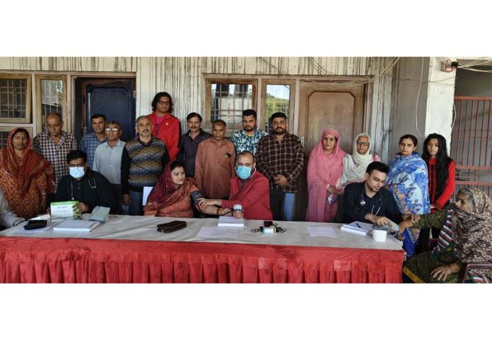 HoD Cardiology GMC & SSH Jammu Dr Sushil Sharma examining patients at Bhalwal on Sunday. HoD Cardiology GMC & SSH Jammu Dr Sushil Sharma examining patients at Bhalwal on Sunday.