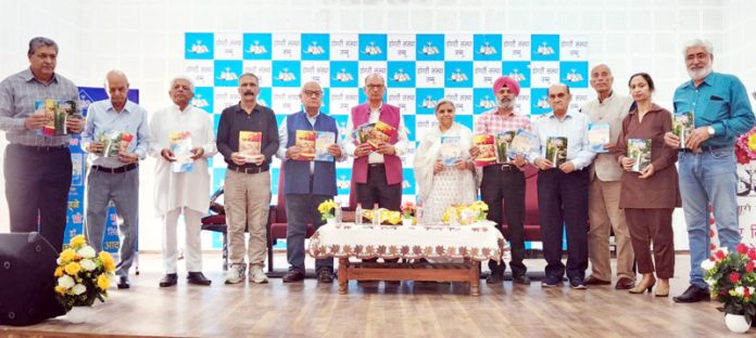 Guests and members of Dogri Sanstha Jammu releasing Jagdeep Dubey's books on Monday.
