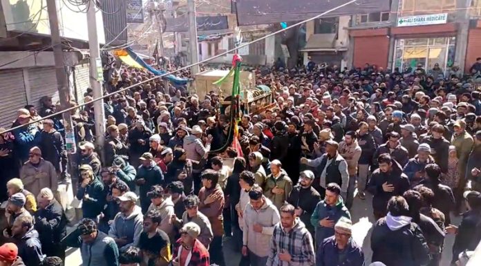 Mourners participating in a religious procession in Kargil on Saturday.