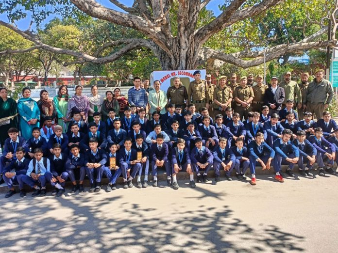 Senior police officers with students of Shri Ranbir Model Higher Secondary School Jammu.