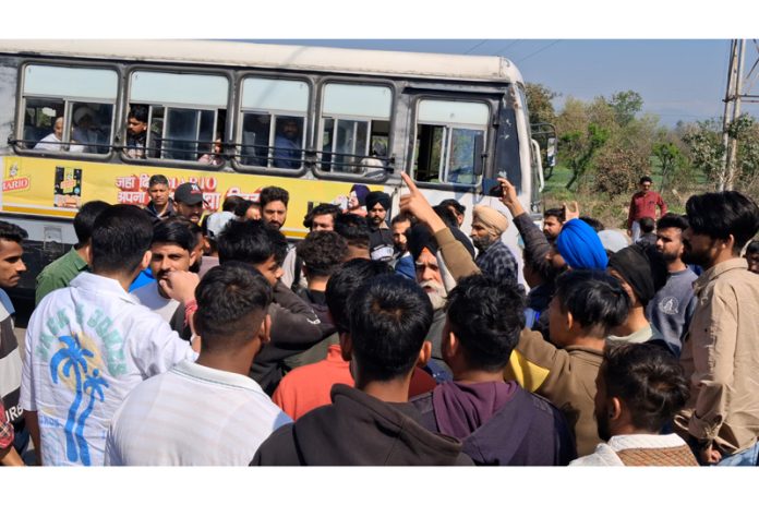 Locals raising slogans against the reckless driving of the dumper operators in Kathua on Saturday.