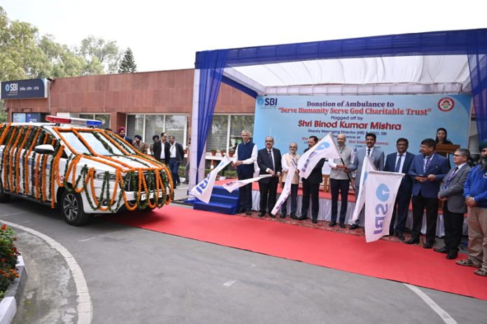 SBI officials donating an ambulance during an event held on Monday.
