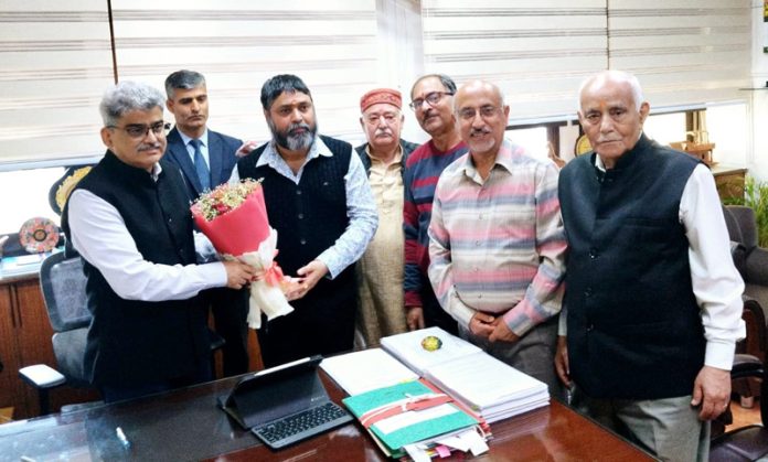 A delegation of KPs posing with Chief Secretary, Atal Dulloo.