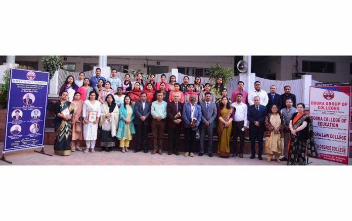 Dignitaries and other participants of a seminar at Dogra Group of Colleges. Dignitaries and other participants of a seminar at Dogra Group of Colleges.