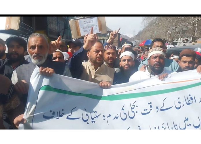 Protesters raising slogans at Ramban on Friday. -Excelsior/ Parvez Mir