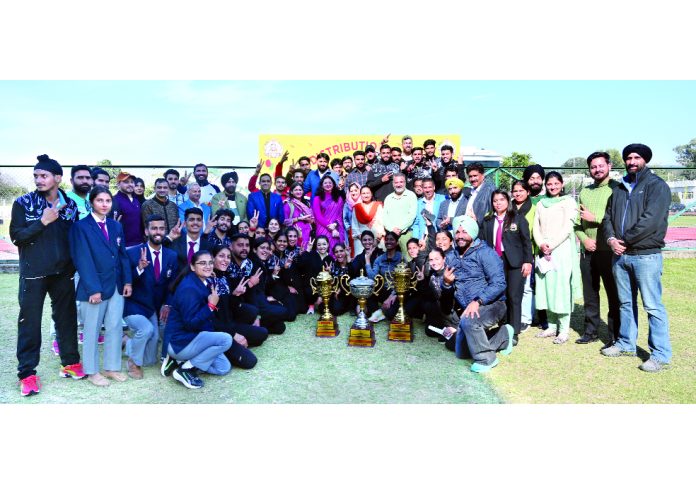 Winning team posing with dignitaries at Jammu University after clinching Overall Championship at the 47th Annual Inter-Collegiate Athletic Meet 2024-25.