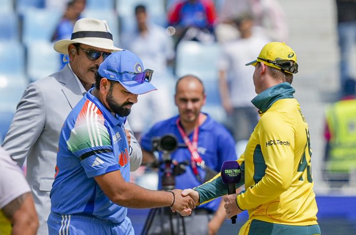 India players pay tribute to Shivalkar, wear black armbands during CT semifinal India players pay tribute to Shivalkar, wear black armbands during CT semifinal