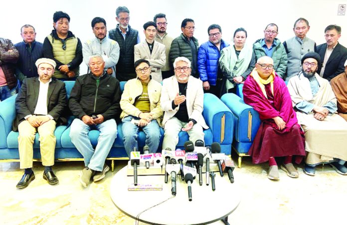 LAB and KDA leaders at a press conference in Kargil on Friday. —Excelsior/Basharat Ladakhi