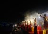 Priests perform Tawi Aarti on the occasion of Baisakhi in Jammu on Sunday : Excelsior/Rakesh
