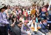 DC Kargil Shrikant Suse posing along with tourists on inaguration of Apricot Blossom Festival in Kargil on Friday.