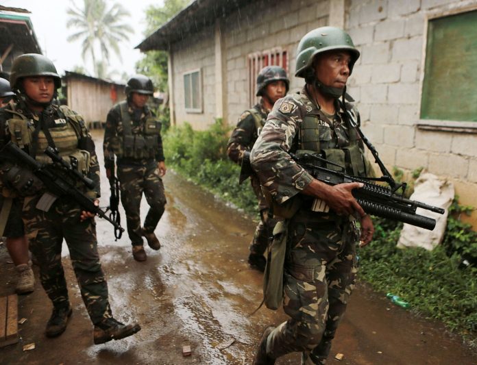 Soldiers kill 5 suspected rebels in central Philippines