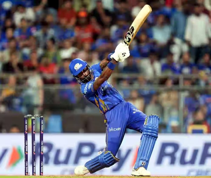 Hardik Pandya playing a shot during his inning of 21 runs against SRH at Mumbai.
