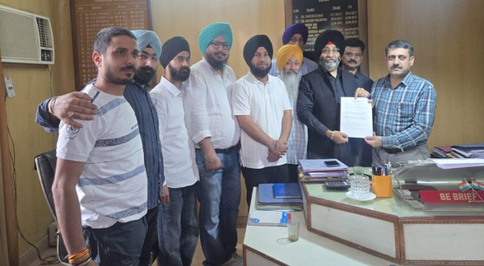 A delegation handing over a memorandum of demands to X-En Irrigation Division 2 in Jammu. A delegation handing over a memorandum of demands to X-En Irrigation Division 2 in Jammu.