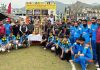 Guests and organizers posing with players on inauguration of Poonch Premier League.