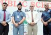 KCPS student Jaideep Singh, who has been selected for National School Games, posing with his coach and School Principal.
