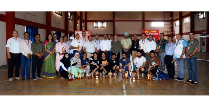 Winners posing along with dignitaries during closing ceremony.