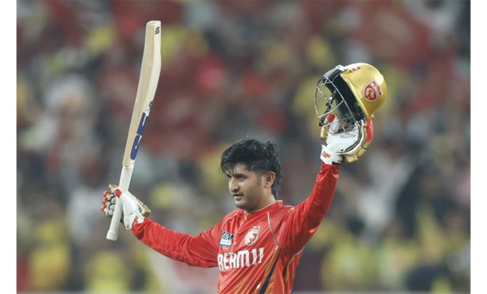 Priyansh Arya raising his bat after scoring brilliant century at Mullanpur on Tuesday.