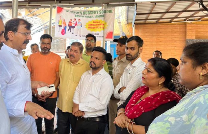 MLA Arvind Gupta interacting with people of Mazdoor Basti in Toph Sherkhania on Monday.