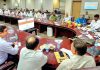Minister Javed Rana interacting with tribal leaders at Panchayat Bhavan Jammu on Saturday.