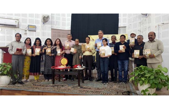 NDS members and guests releasing compilation of Dogri poems by J S Pardesi.
