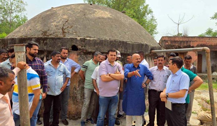 Yudhvir Sethi conducting inspection of a tube well project on Wednesday.