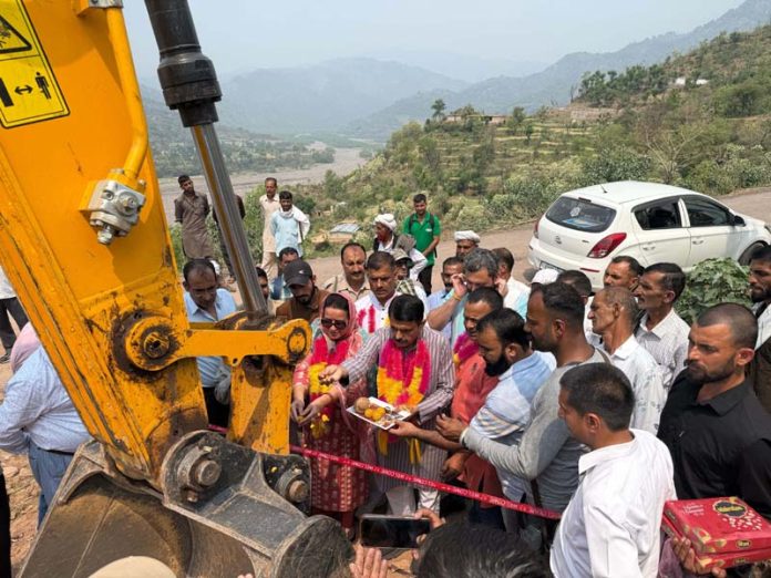 MLA Satish Sharma inaugurating black topping work of a road in Billawar on Wednesday.