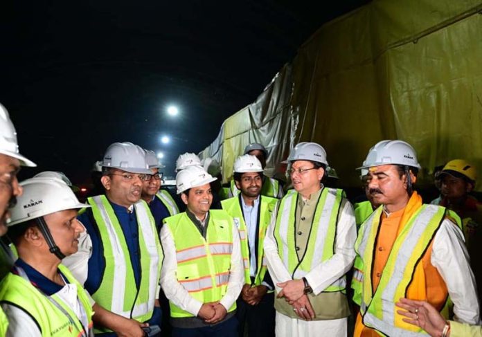 CM Pushkar Singh Dhami interacting with Silkyara Tunnel engineers and workers.