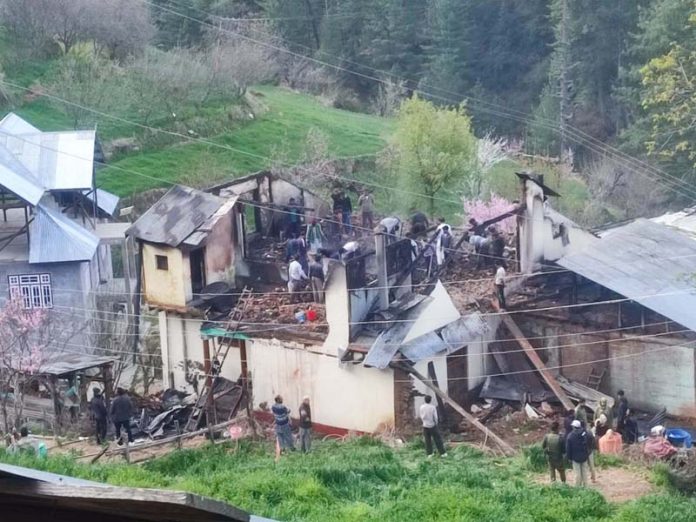 A residential house damaged in fire incident in Doda on Wednesday. -Excelsior/Tilak Raj A residential house damaged in fire incident in Doda on Wednesday. -Excelsior/Tilak Raj