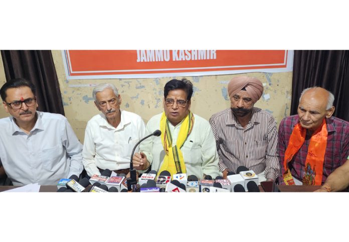 The representatives of Surya Putri Upasana Samiti addressing a press conference at Jammu on Wednesday. -Excelsior/Rakesh