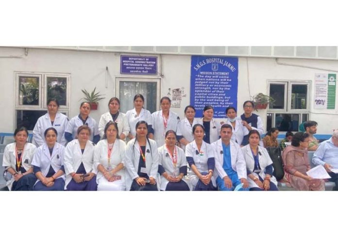 Government employees of various departments during a symbolic protest in Jammu on Tuesday.